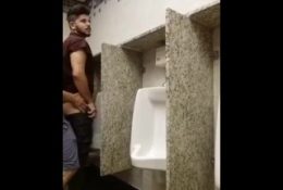 Cruising for sex and breeding a slut at a urinal while being watched