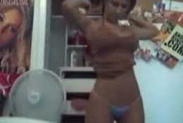 Sexy latina dances while getting dressed