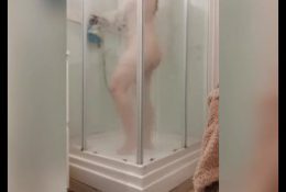 SPY CAMERA IN SHOWER thick redhead in the shower with spy camera
