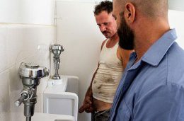 Trashy Men Sucking Big Cock At A Urinal